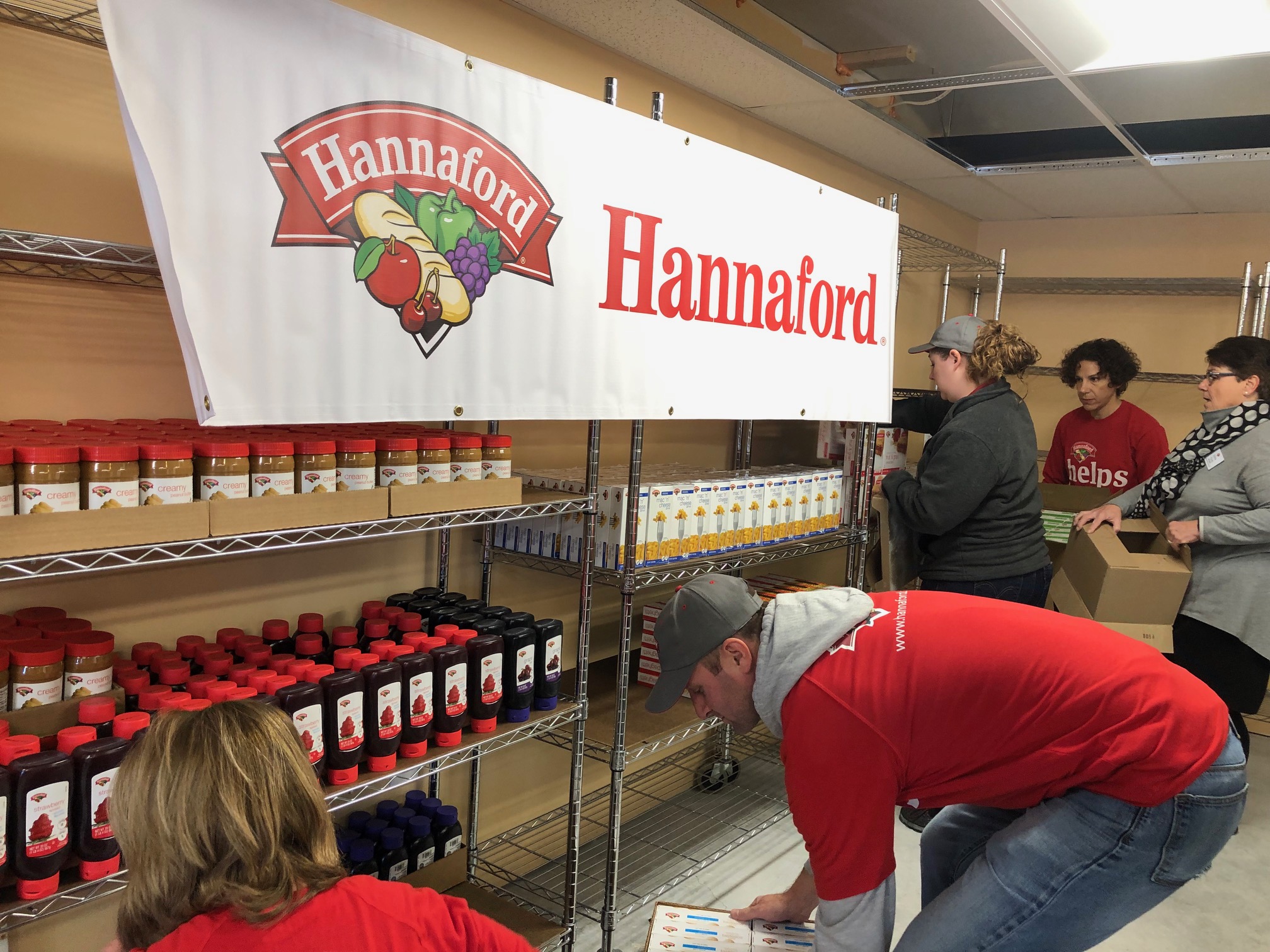 HANNAFORD DONATES 30,000 TO OPEN DOOR MISSION TO EXPAND FOOD PANTRY IN